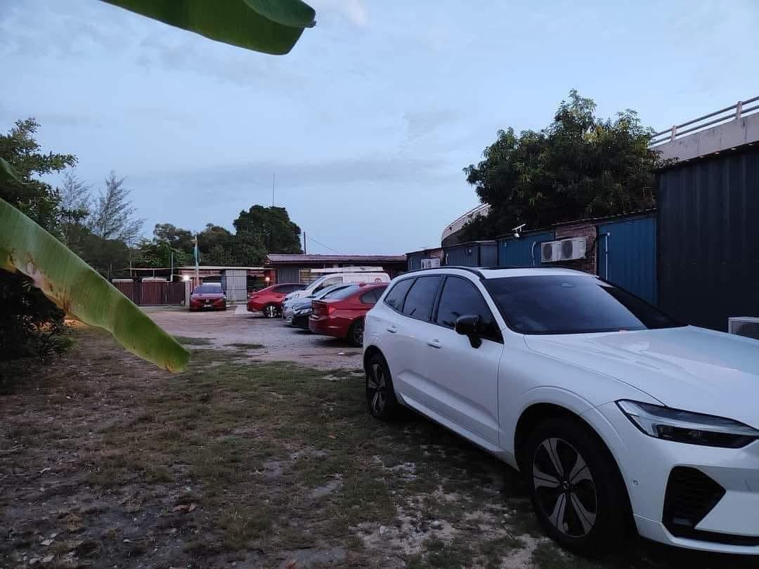 Parking area with guest vehicles